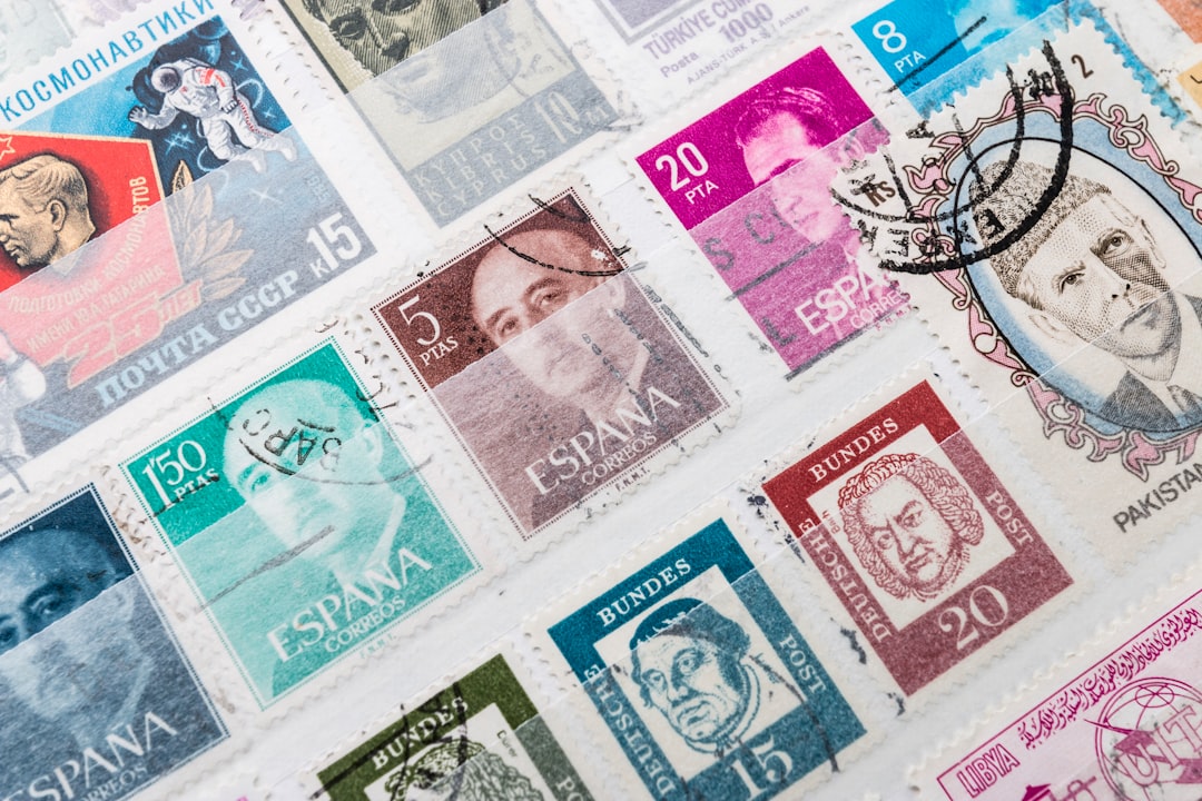 fraud penalties. A bunch of stamps that are on a table