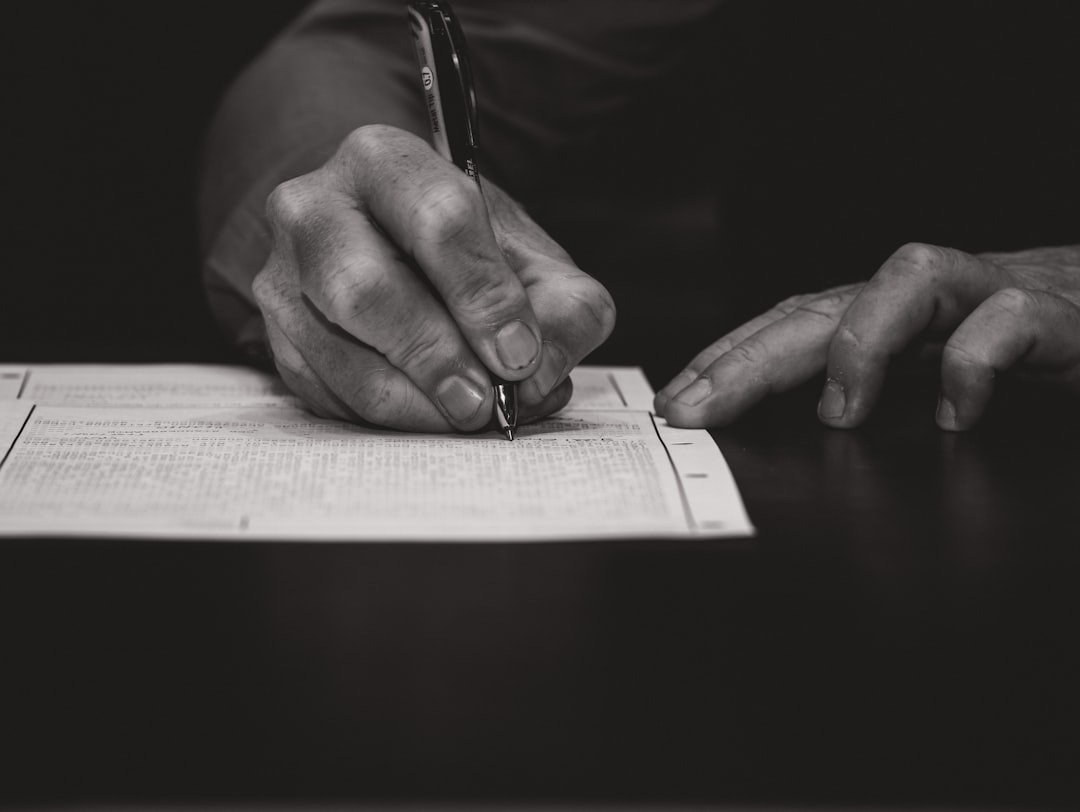verify support animal — Hand writing with a fountain pen on paper.