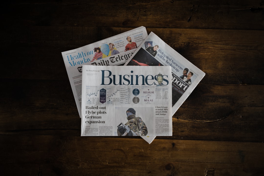 FHA disability definition — a stack of newspapers sitting on top of a wooden table